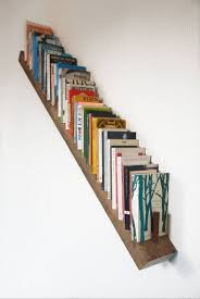 incorporate book storage in around stairs
