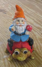 gnome on ladybug a la mold ornamental