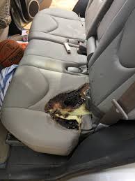 car battery acid spill in back seat if