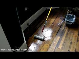 varnish a wood floor roller