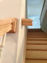 2 diffe style handrails on 1 staircase