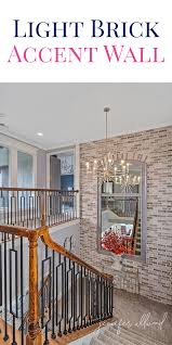 Light Brick Accent Wall Above Stairs