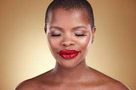 red lipstick makeup and a black woman