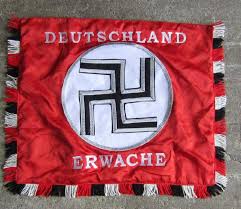 The heavy bandoleer features four rows of silver brocade stitched to the black leather shoulder belt. Lot Post War German Nazi Deutschland Erwache Standarte Banner Flag