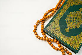 al quran and rosary beads or tasbih