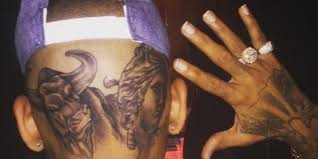 The singer has finished his massive head tattoo and it is pretty intense! A Guide To Chris Brown S Tattoos Chris Brown Fashion And Beauty Bet