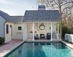 Cottage Style Pool House With Fireplace