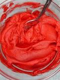 How do you make red icing in the microwave?