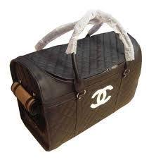 Travel used to be such a stylish affair. Chanel Dog Carrier Designer Dog Carriers Pet Carrier Bag Luxury Pet Carrier