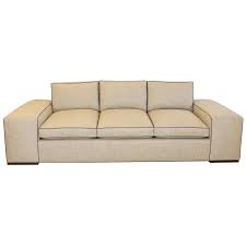 large modern wide arm sofa at