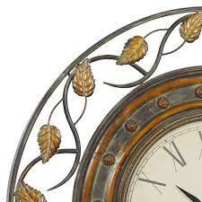 Litton Lane Brown Metal Leaf Wall Clock