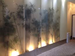 Silk Plants Behind Frosted Glass Gives