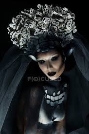 fantasy makeup wearing large crown