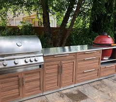 Stone age's cabinet component system™ modular masonry outdoor kitchen islands offer the utmost quality, strength, and durability, as well as unparalleled design flexibility for outdoor kitchens and entertainment areas. Outdoor Kitchen Stainless Steel Kamado Cabinet Newage Products
