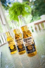 Corona Mexican Beers Sit On A Glass