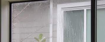 what causes double pane windows to fog