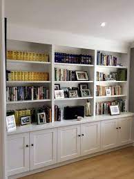 Wall To Wall Shelving With Cupboard