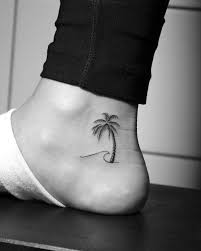 Two vector silhouette of palm trees. 91 Beautiful Palm Tree Tattoo Designs For Tree Lovers