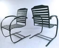 pair of vintage metal spring chairs