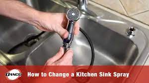 how to change a kitchen sink spray