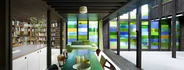 Cottage With Colored Glass Walls And