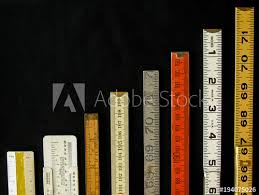 Rulers And Scales In Metric And Inches Ascend Along A Chart