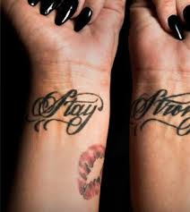 demi lovato lips tattoo on her wrist