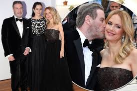 Simone johnson, daughter of the rock. John Travolta S Rarely Seen Grown Up Daughter Ella Bleu Joins Him And Kelly Preston On Red Carpet In Stunning Black And White Gown Mirror Online