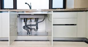 protect kitchen cabinets from water damage