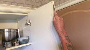 removing the wrap from kitchen cabinets