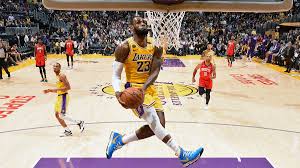 LeBron James' reverse dunk against Rockets captured in stunning photo - CBSSports.com