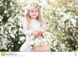 Cute Baby Girl With Flowers In Garden Stock Photo Image Of Enjoy