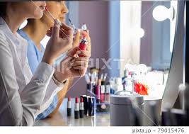 closeup makeup artist teaching woman