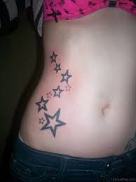 'rain or shine' on the left ribcage tattoo: 50 Wonderful Star Tattoos On Rib