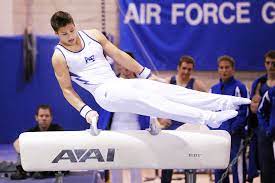 gymnast on balance beam while the four