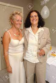 Lesbian Mature Couple Posing And Celebrating With Champaign At Their  Wedding Party After The Official Marriage Ceremony. Same- Marriage Is Fully  Legal In Belgium. Stock Photo, Picture and Royalty Free Image. Image