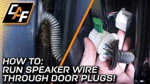 run speaker wire through door plugs