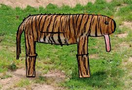 The fun part is adding all those triangles! Using Kid Art To Make A Surrealist Tiger The Artsology Blog