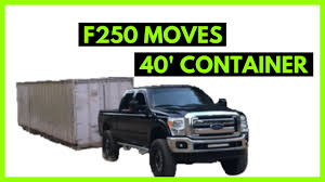 Alternatively a low bed pulled by a hiab equpped tractor could do the job in an hour or two. Moving A 40 Storage Container With A F250 And Homemade Dolly On The Homestead Youtube