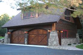 Thinking of building a carriage house plan or garage apartment plan that includes a complete apartment upstairs? Carriage House Lower Whitefish Lake 1 Summer Rustic Garage Minneapolis By Lands End Development Designers Builders Houzz