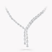 Diamond jewellery inspired by a myriad of motifs, synonymous styles for graff. Classic Graff Pear Shape Cross Over Necklace Diamond Graff