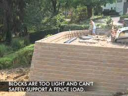 retaining walls fence on top and