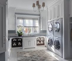 This laundry room from harrison design has lots going for it with its shiplap walls, designated basket storage, farm sink, hanging rod and counter if your laundry room is also used for pet care, why not add a bit of style like this cabinet door with a cat silhouette cut out from brickmoon design? Top 50 Best Laundry Room Ideas Modern And Modish Designs
