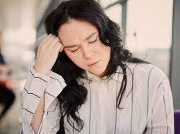 period headaches causes symptoms and