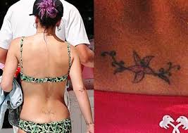 The tattoo is placed beneath her existing inkings on her wrist, is a map of the world. Lily Allen S 5 Tattoos Their Meanings Body Art Guru