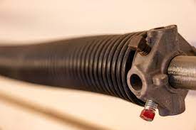 replace a garage door spring only after
