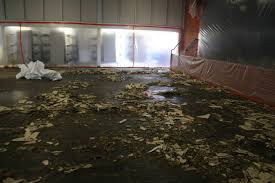 is removing asbestos floor tile