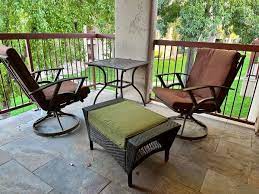 Two Patio Chairs That Swivel