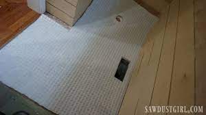 install tile flush with hardwood floors
