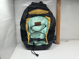 dakine small backpack gold teal blue